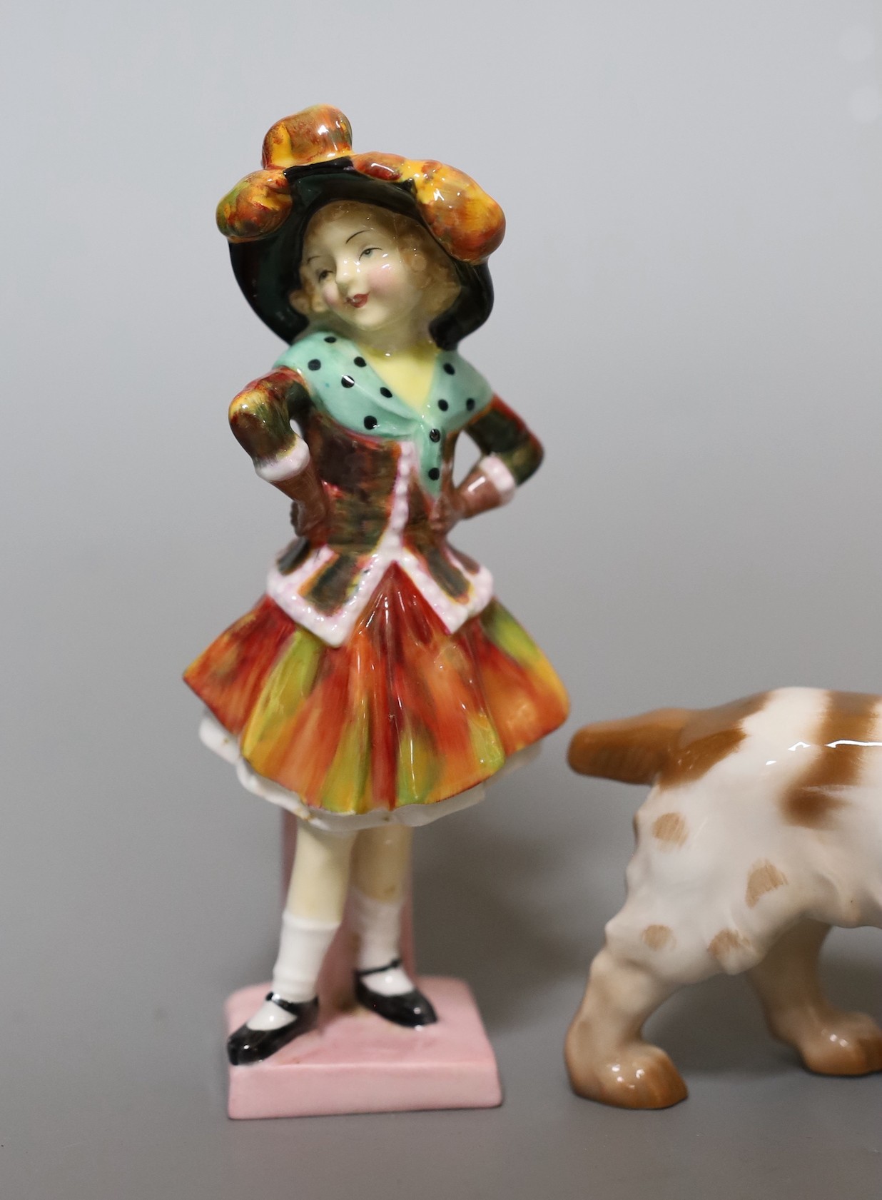 A Royal Doulton figure,”Pearly Girl”, HN 2036, two Bing and Grondahl birds and a dog, figure 14 cms high